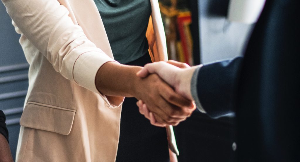 Woman shaking hands